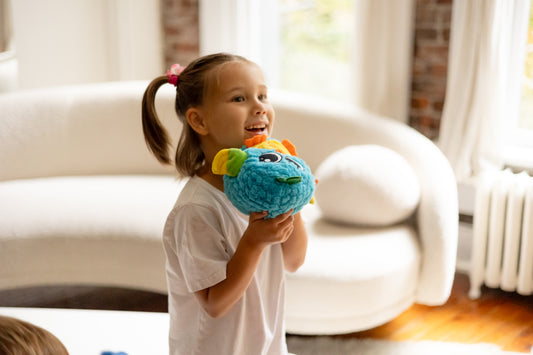 Plush donkey baby toy with moving ears, offering Peek-A-Boo interaction, phrases, and musical functions including nursery rhymes. Soft, huggable design ideal for cuddles, made for early childhood learning and modern parenting solutions.
