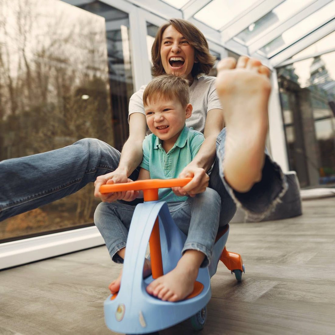appy toddler enjoying outdoor play with Kiddolab's safe and fun outdoor toys, perfect for physical development.
