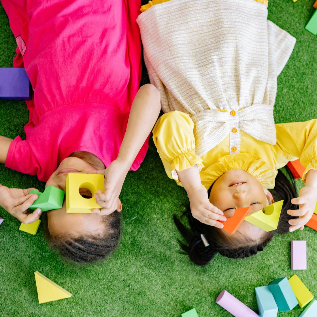 Joyful child engaged in play with Kiddolab educational toys, illustrating cognitive and emotional growth